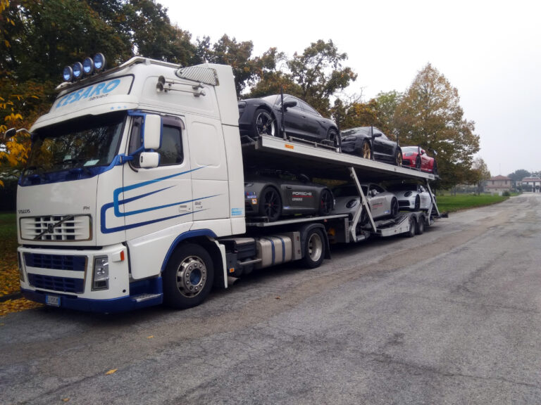 The Porsche Taycan being transported by Truck 8